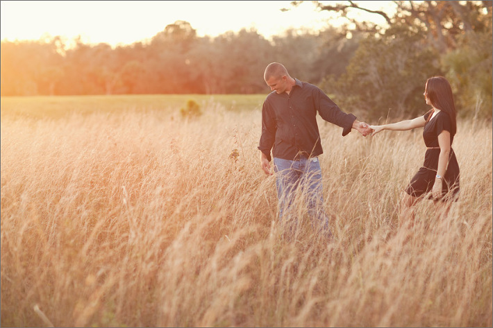 wide engagement, wide angle shot, creative engagement photography, vero beach wedding photographer, sebasitan wedding photographer, sunset field, engagement field, tall grass engagement