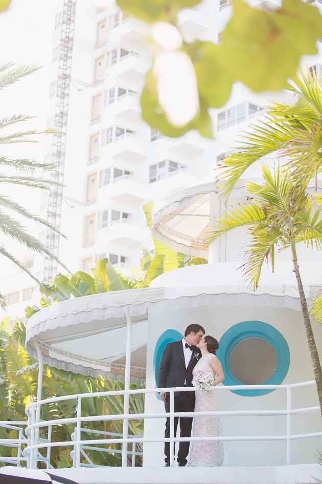 raleigh hotel, raleigh hotel wedding, miami beach wedding, raleighi miami wedding, south beach wedding, miami wedding photographer, south florida wedding photographer, orchid centerpieces, black and white stripes, simple wedding, vitalic photo, lace wedding dress, blush wedding dress